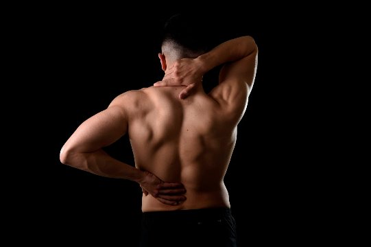 Physiotherapist discussing treatment options with a patient